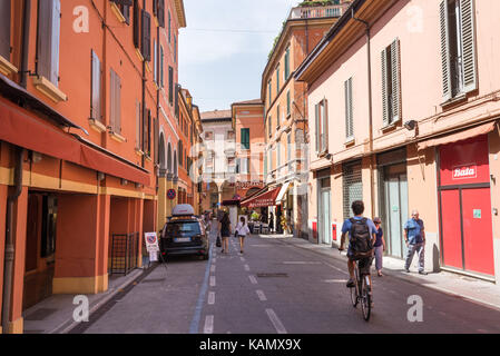 People in the medieval historical centre of Bologna city. Emilia-Romagna region, Northern Italy. Stock Photo