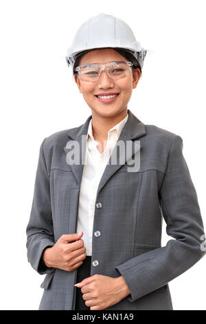 female engineer wearing white helmet standing on white Stock Photo