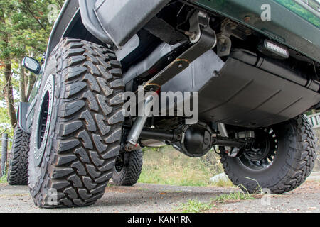 Chassis off road vehicle in the parking lot. The undercarriage of terrain car on way in nature. Stock Photo