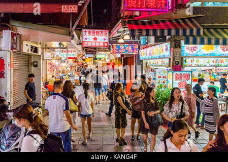 TAIPEI, TAIWAN - JULY 11: This is Shilin night market a famous night market where many people come to try Taiwanese food and go shopping on July 11, 2 Stock Photo