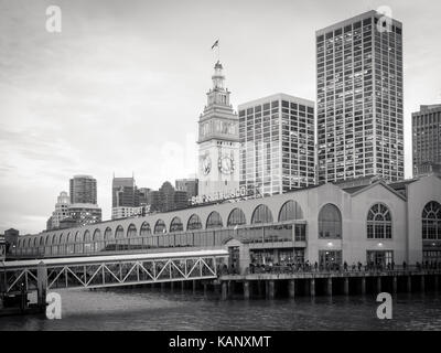 A black-and-white photo of the San Francisco Ferry Building, which is located on The Embarcadero in San Francisco, California. Stock Photo