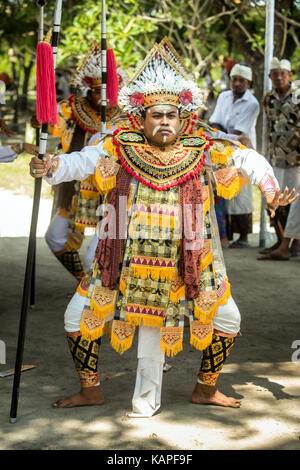 Balinese warrior dance performed on Kuningan day on the Indonesian island of Bali. Traditional Balinese cultural dance during a Bali cultural event Stock Photo