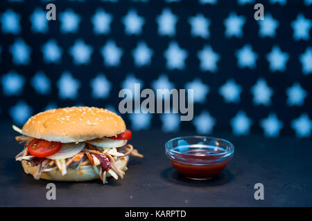 Pulled pork hamburger with ketchup Stock Photo