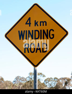4km Winding road signage. Stock Photo