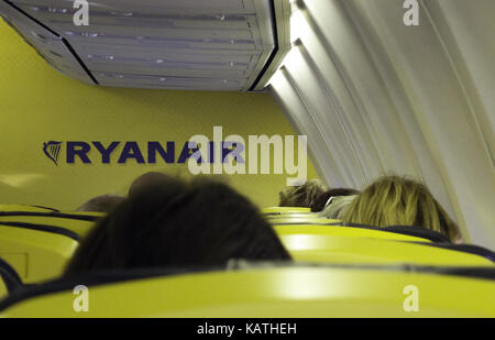 (FILE) An archive photo dated 04 April 2011 shows Passengers sitting in a Ryanair airplane in Weeze, Germany. Photo: Caroline Seidel | usage worldwide