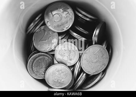 Box of coins (russian rubles).  Black and white version. Stock Photo