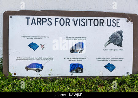 Everglades National Park, Florida.  Sign Warning Visitors to Use Tarps to Cover Cars to Protect from Vultures which Chew Plastic Around Windows. Stock Photo