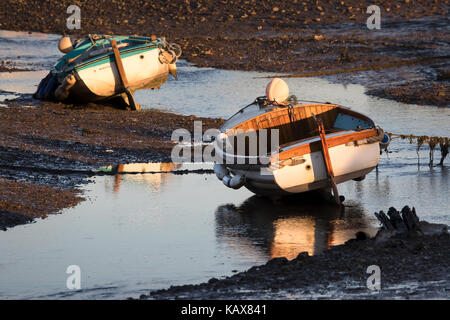 keeled boats hauled out in Morston creek / channel, Norfolk Stock Photo