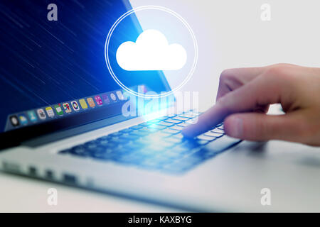 Concept of cloud storage icon flying out a computer - technology ...