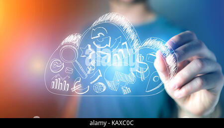 View of a Man drawing business icons on a cloud on a technology futuristic interface Stock Photo