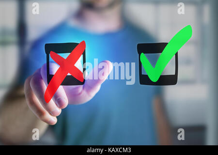 View of a Man finger touching a hand drawn red and green tick icon on a futuristic interface - technology concept Stock Photo