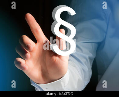 View of a Justice and law symbol displayed on a futuristic interface - Technology and business concept Stock Photo