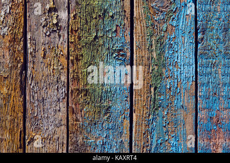 Wooden shabby background of boards painted with bright colors Stock Photo
