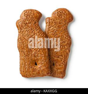 Traditional Dutch taaitaai to eat on sinterklaas evening on white background Stock Photo