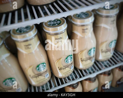 Bottles of Starbucks Frappuccino coffee are seen a supermarket cooler on Thursday, September 14, 2017. McDonald's is reported to be coming out with their own line of ready-to-drink bottled coffee beverages in 2018. (© Richard B. Levine) Stock Photo