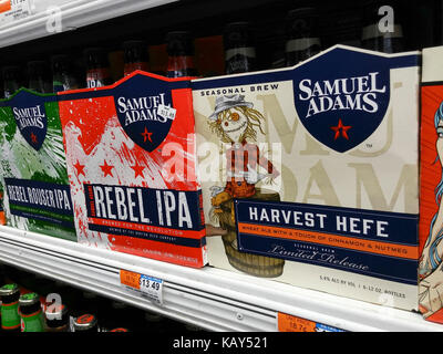 Six-packs of Samuel Adams beer are seen on a grocery store shelf in New York on Tuesday, September 26, 2017.  Boston Beer Co.,  the not quite micro-brewery brewer, has had its rating raised from underperform to neutral by Credit Suisse based on the fact that if it continues to perform poorly it is a takeover target by a larger brewery.. (© Richard B. Levine) Stock Photo