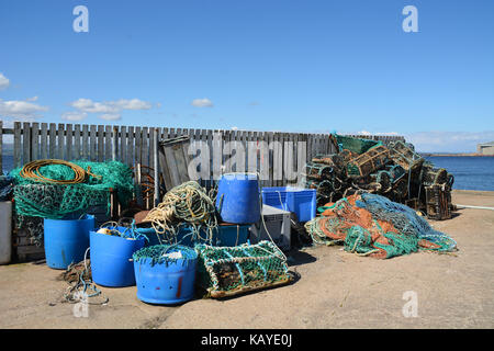 Fishing Gear sitting on a pier Stock Photo