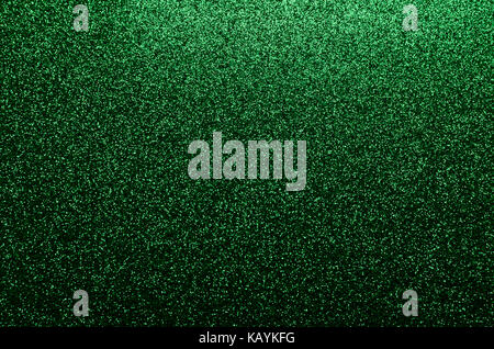 Green glittering background suitable for a festive scene Stock Photo