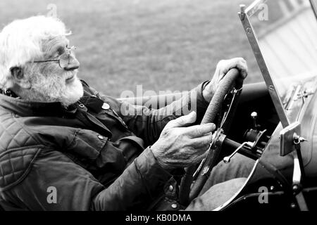 Old man and grandson in classic car at Kop Hill Climb Stock Photo