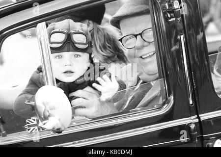 Grandfather and young boy in classic car at Kop Hill Climb Stock Photo