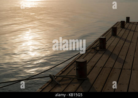 The old wharf at dawn in the morning. Stock Photo