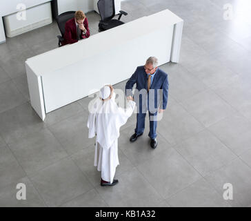 Warm welcome to Arabian citizen on airport Stock Photo