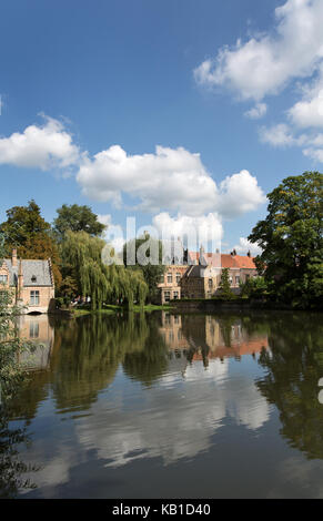 City of Bruges, Belgium. Picturesque view of Minnewater Lake on the outskirts of Bruges city centre. Stock Photo