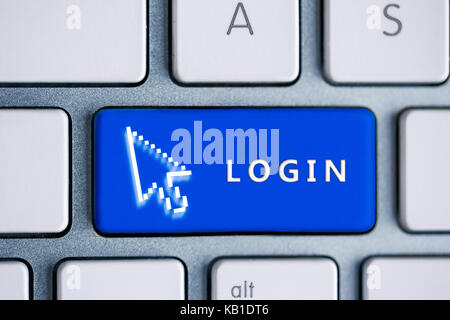computer keyboard with login button Stock Photo