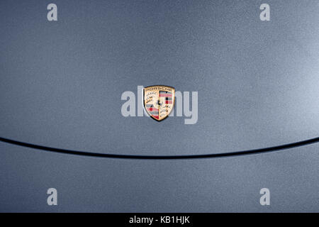 Porsche 911 bonnet detail with badge and grey metallic paintwork. Stock Photo