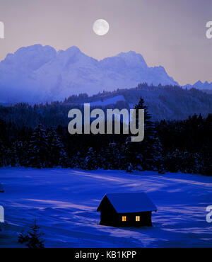 Winter evening near Garmisch against Zugspitze, full moon night, Stock Photo