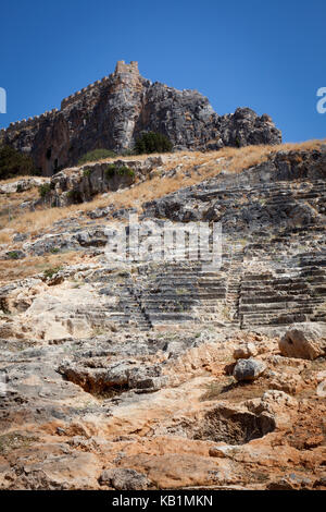 The remains of the amphitheatre in Lindos on the Greek island of Rhodes Stock Photo