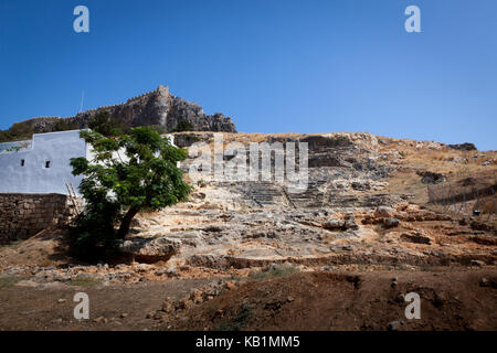 The remains of the amphitheatre in Lindos on the Greek island of Rhodes Stock Photo