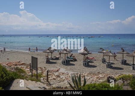 Sun loungers on a perfect Summers day in Menorca Stock Photo