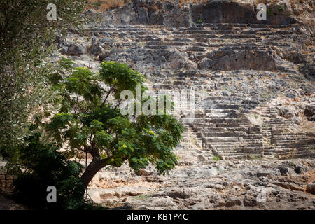 The remains of the amphitheatre in Lindos on the Greek island of Rhodes Stock Photo