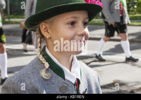 Germany, Bavaria, Munich, Oktoberfest, traditional parade, girl in traditional costume, Stock Photo