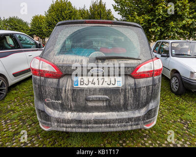 Very dirty Ford C-Max car, France. Stock Photo