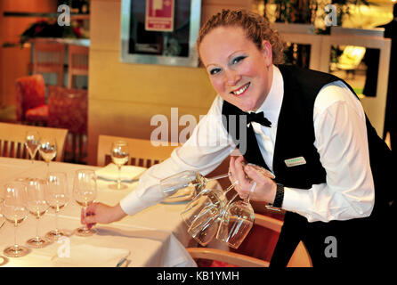 Portugal, Lisbon, service while covering the tables in the restaurant of the 'El Corte Ingles', Stock Photo