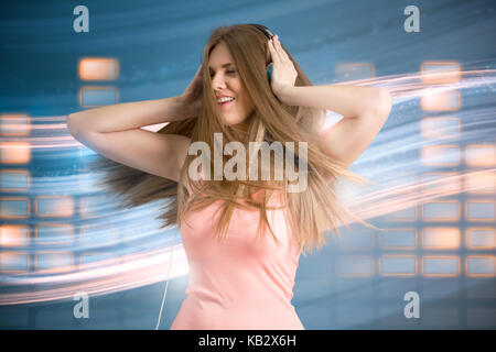 Attractive woman dancing and enjoying in music Stock Photo