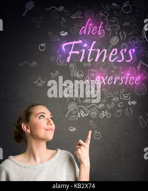 Young woman planning her recreational activities Stock Photo