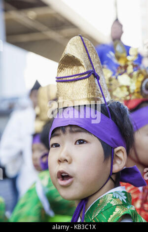 Japan, Honshu, Tokyo, Asakusa, Jidai Matsuri festival, boy in traditional costume, Stock Photo