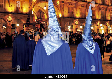 Spain, Kastilien-Leon, night Easter procession of the Semana Santa around the plaza Mayor in Salamanca, Stock Photo