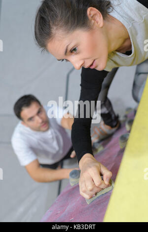 young woman cleaning her room Stock Photo