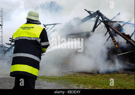 Conflagration in Eberfing near Weilheim, Bavaria, fire of an agricultural building is deleted by a major operation of the voluntary fire brigades with approx. 200 men, Stock Photo