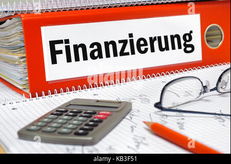 Financing, folder with documents and electronic calculator, Stock Photo