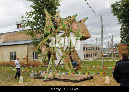 June, 2017, Odoev (Russia): Folk Festival 'Grandfather Filimon's Tales' - old carousel. Stock Photo