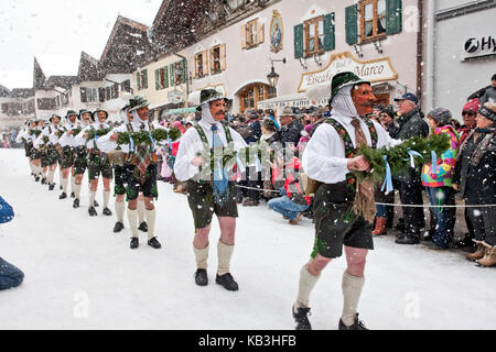Germany, Bavaria, Mittenwald, carnival procession, Schellenrührer (traditional figures of the local carnival), Stock Photo