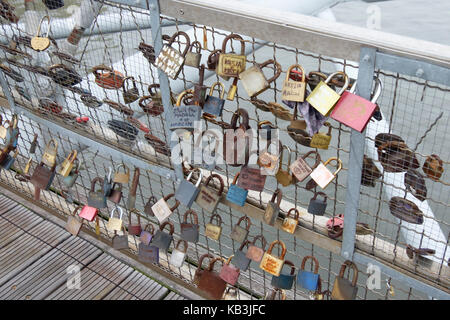 Padlocks on the Father Bernatek Footbridge in Krakow, Poland, Europe Stock Photo