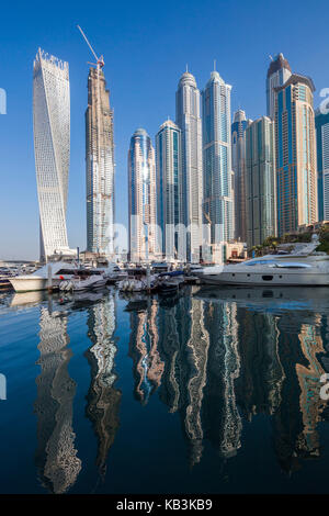 UAE, Dubai, Dubai Marina, high rise buildings including the twisted Cayan Tower, morning Stock Photo