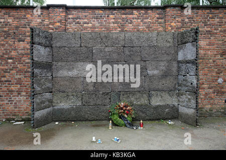 Wall used for firing squad executions at the Auschwitz WWII Nazi concentration camp, Poland Stock Photo