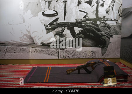 UAE, Abu Dhabi, Sheikh Zayed Research Center, photo of Sheikh Zayed bin Sultan with AK-47 rifle